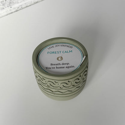 Forest Calm Candle with white dust cover label